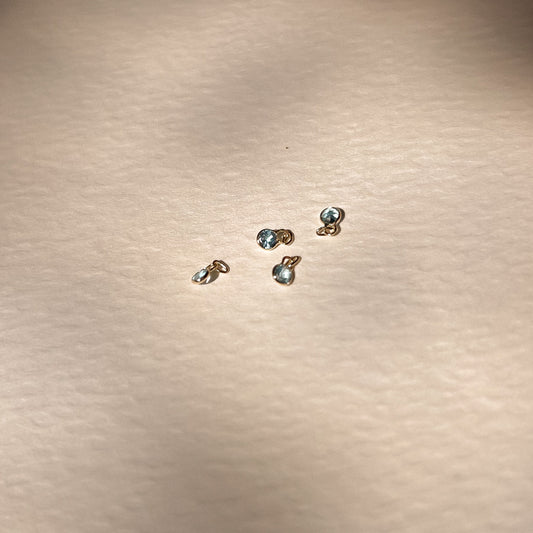Swiss Blue Topaz Charm Natural Round Bezel Set in 14k Yellow Gold