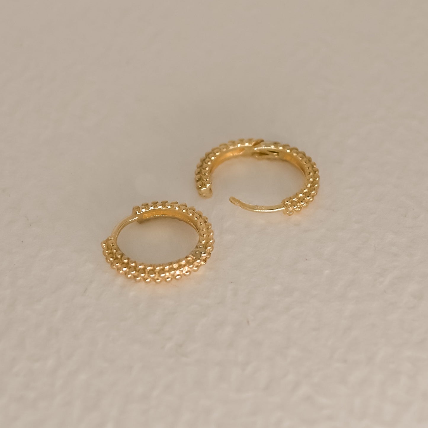 Brita Textured Solid 9k Gold Hoop Earrings