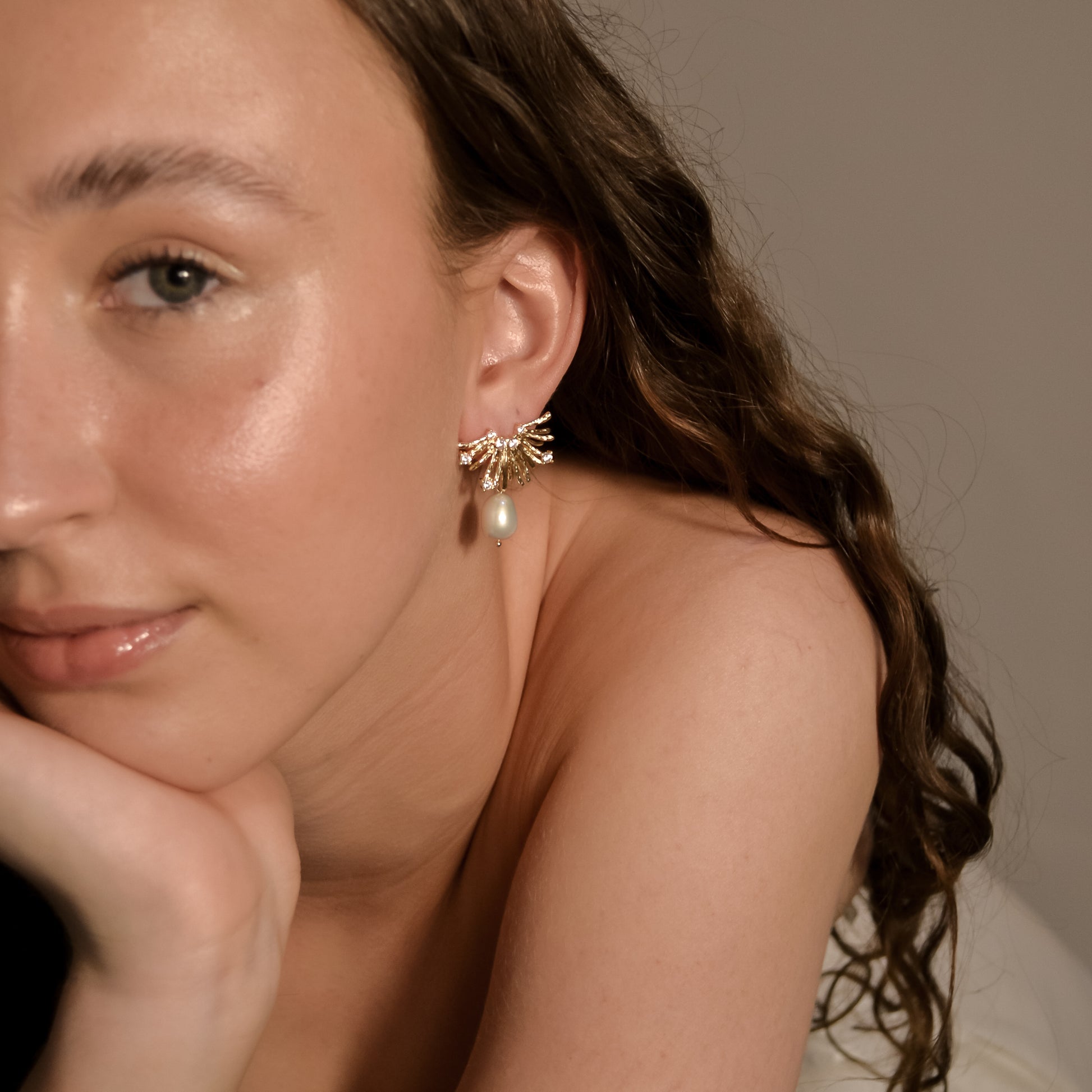 model wearing Charlotte collection, pearl drop earring gold
