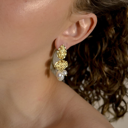 model wearing Clara range, gold bridal seed pearl modern drop earrings