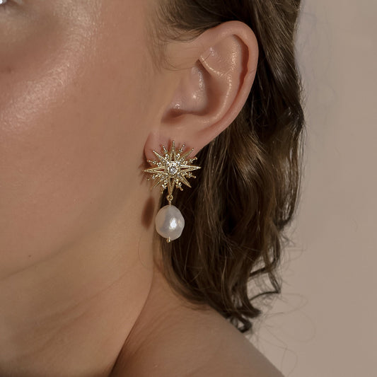 model wearing Clementine  range, gold bridal seed pearl unique, stud star,  earrings