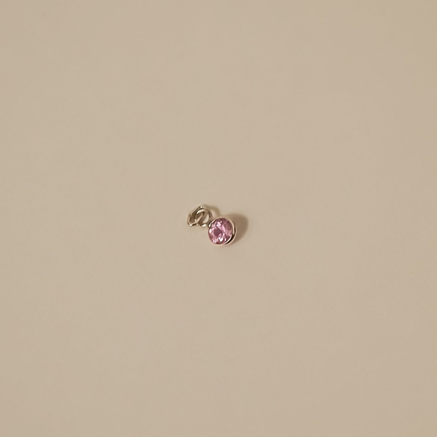 pink sapphire white gold round, tiny charm