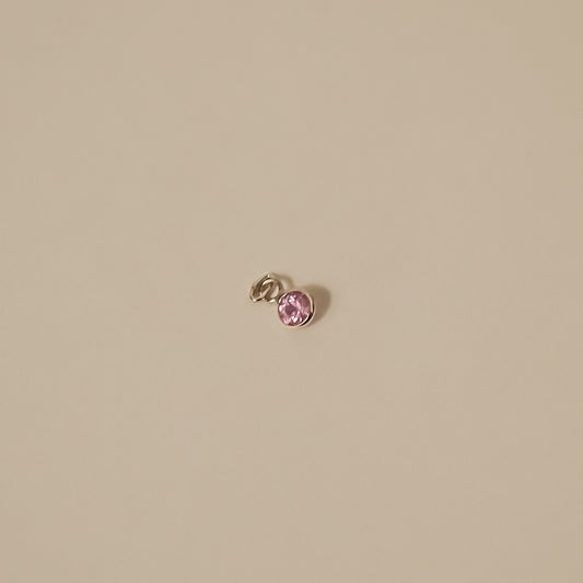pink sapphire white gold round, tiny charm