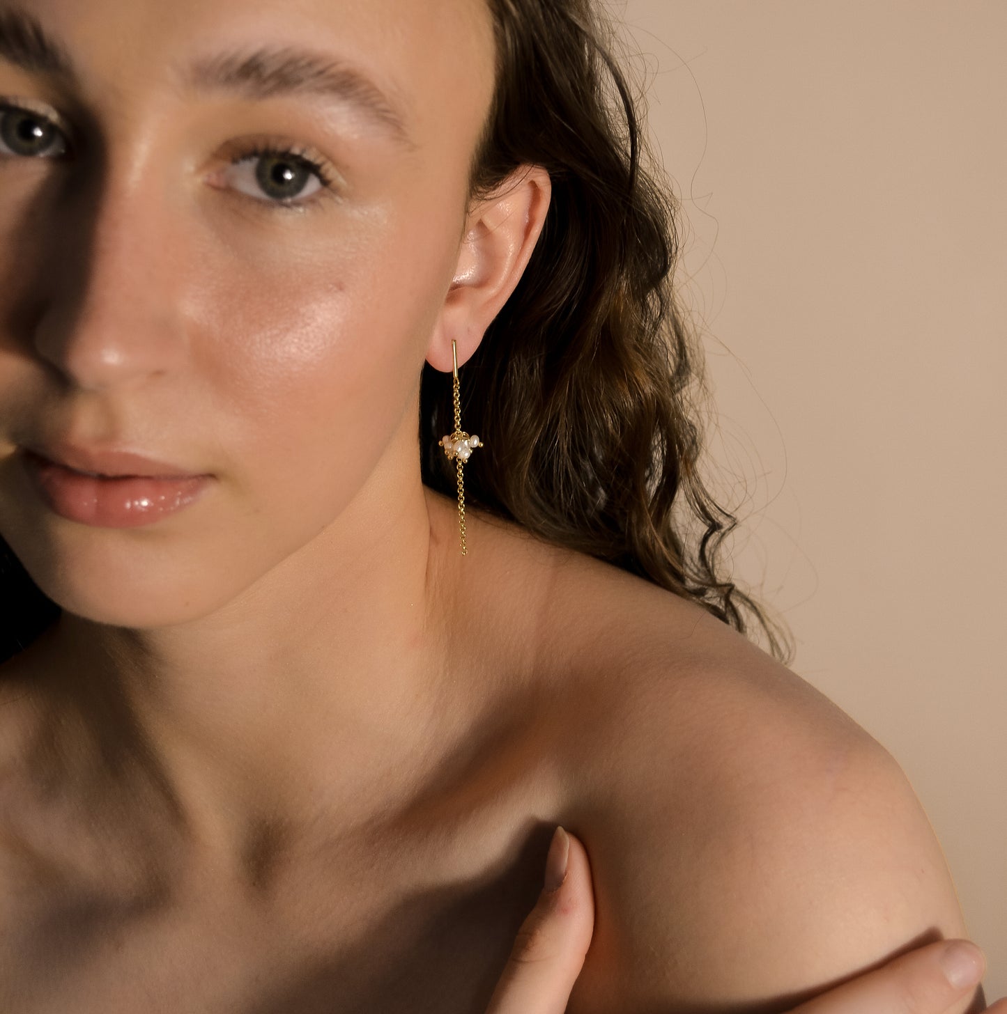 model wearing Willow collection, bridal, simple, elegant, gold chain, drop pearl cluster earrings.