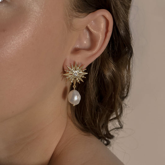 model wearing Clementine  range, gold bridal seed pearl unique, stud star,  earrings 