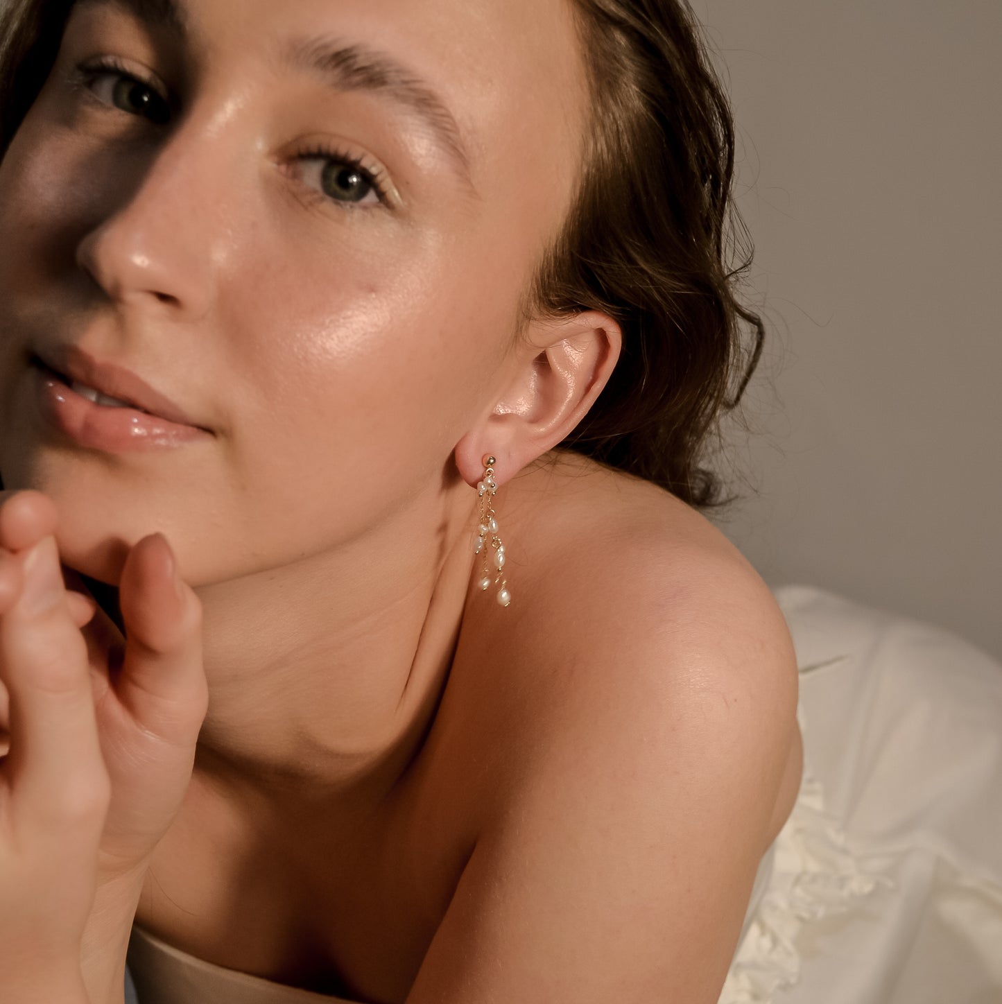model wearing Dulcie collection, wedding pearl, gold chain earrings, handmade, designer