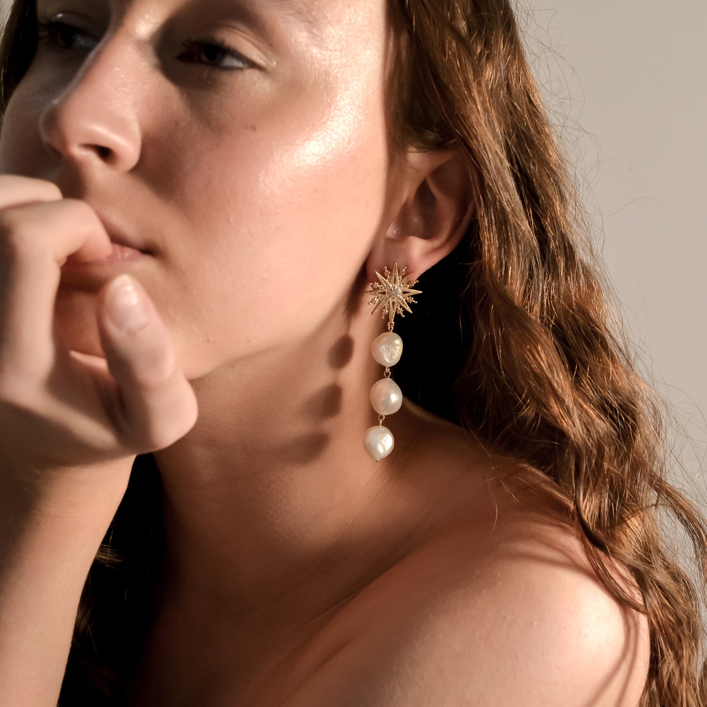 model wearing Ella collection, large triple pearl drop,  gold stud earring, handmade designer 