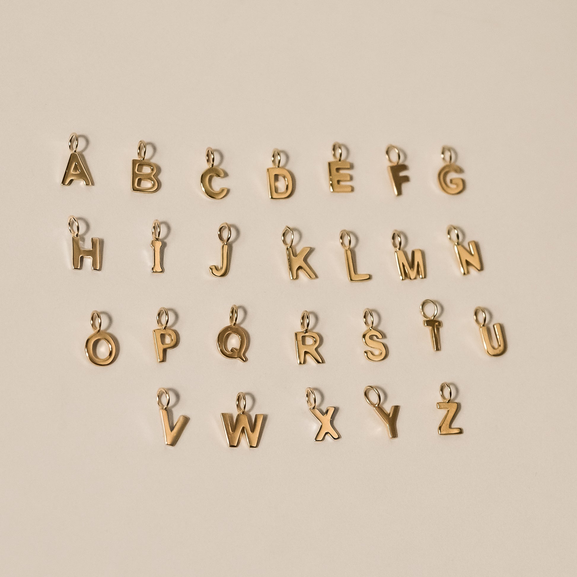 initial charm yellow gold tiny letter 