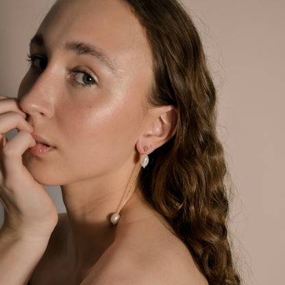 model wearing Lennon gold pearl long drop chain earrings, handmade 