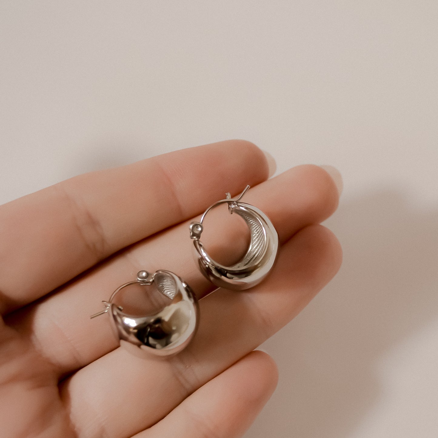 Tiani collection statement piece chunky silver earrings 